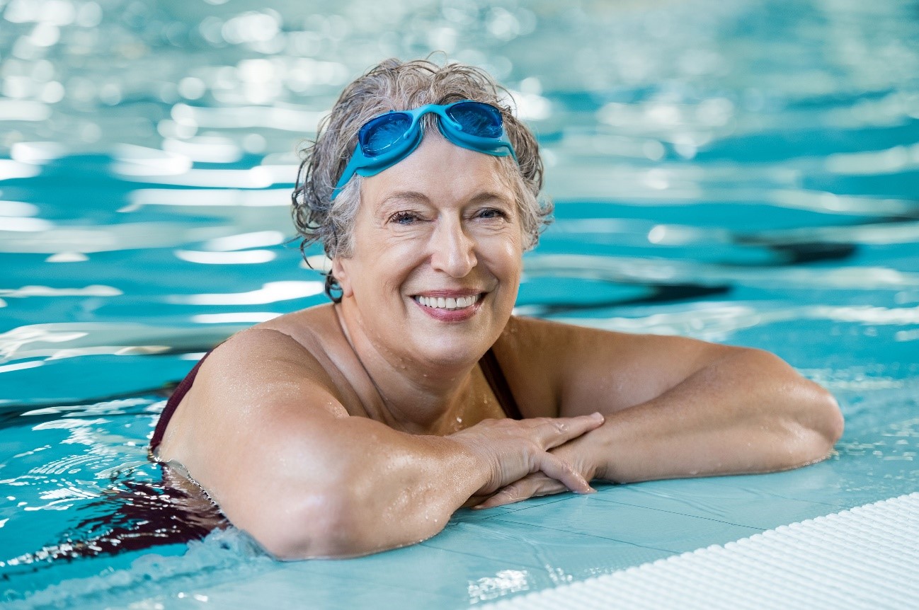 How can swimming improve balance?